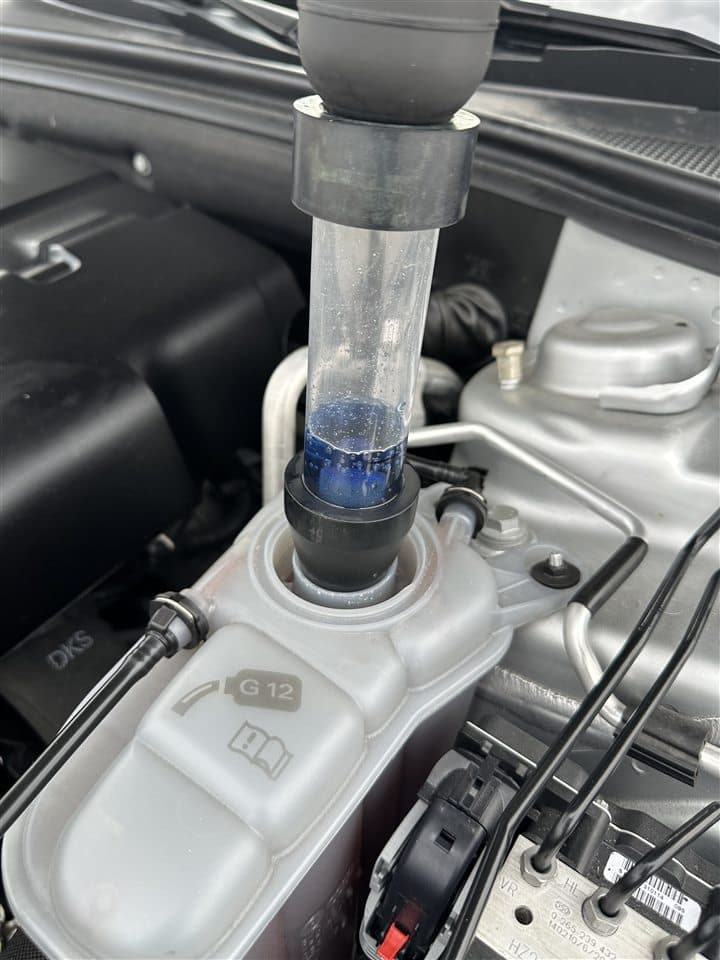 Vehicle cooling system being checked